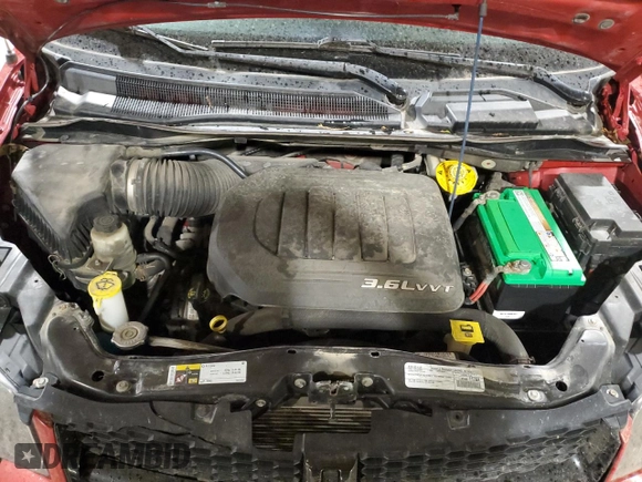 2015 Dodge Grand Caravan SXT with VIN 2C4RDGCG6FR685486, listed as a Copart auction lot 49596715 with 185,444 mi miles and Salvage Title. Bid and sale history available at DreamBid. Image 12.