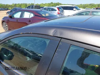 2014 Mazda 3 i Touring with VIN 3MZBM1V72EM103737, listed as a IAAI auction lot 41347933 with 197,006 mi miles and . Bid and sale history available at DreamBid. Image 17.