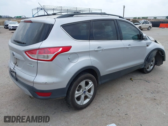 2013 Ford Escape SE with VIN 1FMCU0GX9DUD68711, listed as a IAAI auction lot 42243521 with 120,441 mi miles and . Bid and sale history available at DreamBid. Image 4.