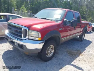 1999 Ford Super Duty F-250 XL with VIN 1FTNX21S2XEA61120, listed as a IAAI auction lot 42046522 with 1,658,775 mi miles. Bid and sale history available at carsss.com. Image 2.