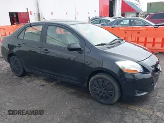 2008 Toyota Yaris with VIN JTDBT903284012329, listed as a IAAI auction lot 41879489 with 117,041 mi miles. Bid and sale history available at carsss.com. Image 1.
