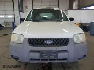 2001 Ford Escape XLS with VIN 1FMYU01181KF33553, listed as a Copart auction lot 52991765 with 214,453 mi miles and Clean Title. Bid and sale history available at carsss.com. Image 5.