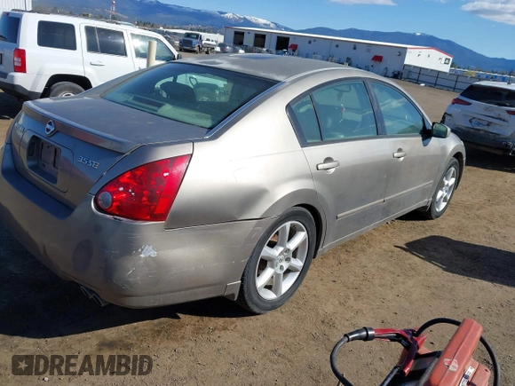 2004 Nissan Maxima SE with VIN 1N4BA41E34C899003, listed as a IAAI auction lot 41951346 with 186,746 mi miles and . Bid and sale history available at DreamBid. Image 4.