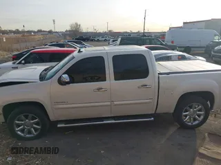 2011 GMC Sierra 1500 Denali z VIN 3GTP2XE20BG152905, wystawiony jako IAAI lot #41079419 z przebiegiem 158 192 mil mil oraz . Historia ofert i sprzedaży dostępna na DreamBid. Obrazek 15.