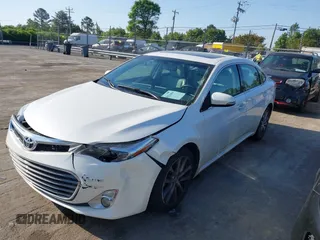 2015 Toyota Avalon Limited with VIN 4T1BK1EB0FU191399, listed as a IAAI auction lot 42022664 with 140,370 mi miles and . Bid and sale history available at DreamBid. Image 2.