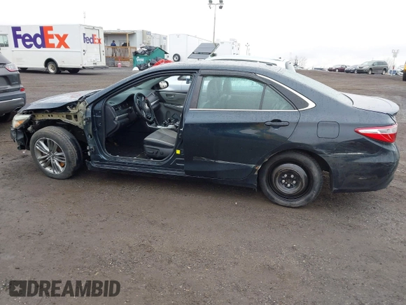 2015 Toyota Camry XLE with VIN 4T1BF1FK1FU087653, listed as a IAAI auction lot 41942940 with 180,274 mi miles. Bid and sale history available at carsss.com. Image 14.