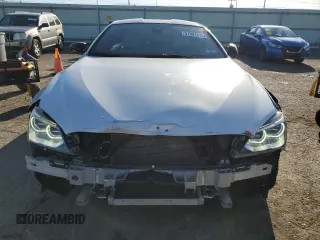 2015 BMW M6 z VIN WBSLX9C51FD160757, wystawiony jako Copart lot #51991315 z przebiegiem 71 133 mil mil oraz Szkody całkowita. Historia ofert i sprzedaży dostępna na DreamBid. Obrazek 5.