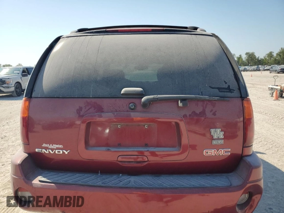 2007 GMC Envoy SLT with VIN 1GKDS13S972171766, listed as a Copart auction lot 76034004 with 182,358 mi miles and Salvage Title. Bid and sale history available at carsss.com. Image 6.