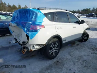 2017 Toyota RAV4 LE with VIN JTMBFREV1HJ146865, listed as a IAAI auction lot 41645327 with 142,191 mi miles. Bid and sale history available at carsss.com. Image 4.