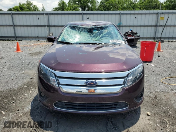 2012 Ford Fusion SE z VIN 3FAHP0HAXCR253297, wystawiony jako Copart lot #60302645 z przebiegiem 138 619 mil mil oraz Szkoda całkowita • Salvage title. Historia ofert i sprzedaży dostępna na DreamBid. Obrazek 5.