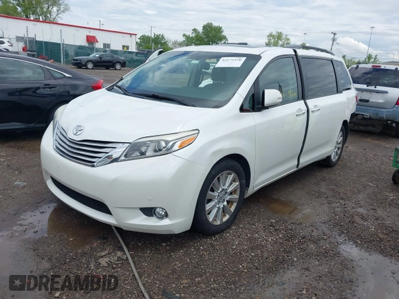 2015 Toyota Sienna XLE with VIN 5TDYK3DC3FS529256, listed as a IAAI auction lot 42172570 with 163,725 mi miles and . Bid and sale history available at carsss.com. Image 2.