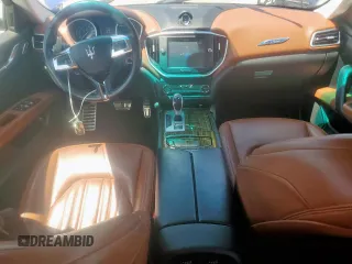 2015 Maserati Ghibli S Q4 z VIN ZAM57RTA5F1149402, wystawiony jako Copart lot #58041035 z przebiegiem 105 319 mil mil oraz Tytuł czysty. Historia ofert i sprzedaży dostępna na DreamBid. Obrazek 8.