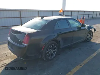 2015 Chrysler 300 with VIN 2C3CCAGG8FH808618, listed as a IAAI auction lot 41695711 with 137,050 mi miles. Bid and sale history available at carsss.com. Image 4.