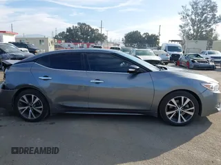2017 Nissan Maxima SV with VIN 1N4AA6AP4HC404371, listed as a IAAI auction lot 41489579 with 117,677 mi miles. Bid and sale history available at carsss.com. Image 13.