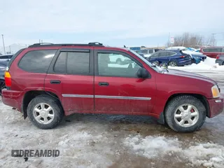 2008 GMC Envoy SLE2 with VIN 1GKDT13S182132619, listed as a IAAI auction lot 41605231 with 138,458 mi miles. Bid and sale history available at carsss.com. Image 13.
