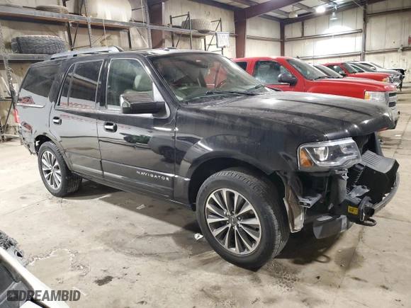 2015 Lincoln Navigator with VIN 5LMJJ2JT4FEJ14755, listed as a Copart auction lot 42021725 with 72,711 mi miles and Salvage Title. Bid and sale history available at carsss.com. Image 4.