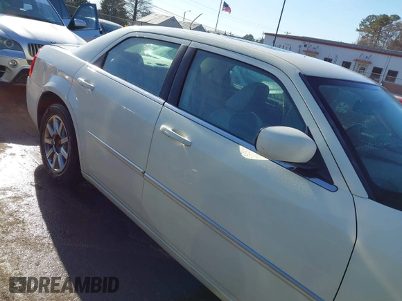 2008 Chrysler 300 Touring with VIN 2C3LA53G58H224652, listed as a IAAI auction lot 41460154 with 274,575 mi miles. Bid and sale history available at carsss.com. Image 13.
