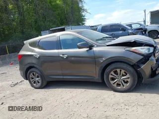 2014 Hyundai Santa Fe with VIN 5XYZTDLB2EG143925, listed as a IAAI auction lot 42243761 with 126,058 mi miles and . Bid and sale history available at DreamBid. Image 13.