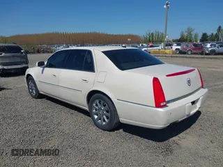 2008 Cadillac DTS 1SC with VIN 1G6KD57YX8U209792, listed as a IAAI auction lot 42003838 with 113,026 mi miles and . Bid and sale history available at carsss.com. Image 3.