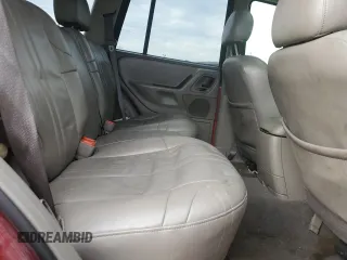 2003 Jeep Grand Cherokee Laredo z VIN 1J4GW48S73C523300, wystawiony jako Copart lot #73612503 z przebiegiem 109 570 mil mil oraz Nie do naprawy • Non repairable. Historia ofert i sprzedaży dostępna na DreamBid. Obrazek 11.