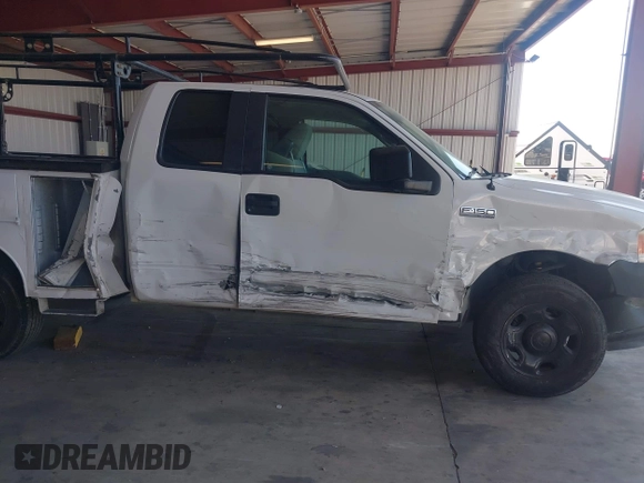 2007 Ford F-150 STX with VIN 1FTRX12W57KA80484, listed as a IAAI auction lot 42618913 with 199,013 mi miles and . Bid and sale history available at DreamBid. Image 6.