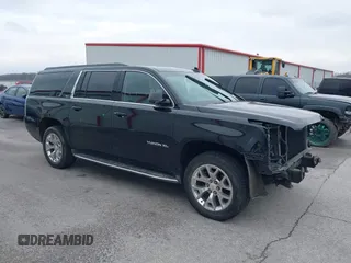 2015 GMC Yukon XL SLT with VIN 1GKS2HKC6FR746809, listed as a IAAI auction lot 41559570 with 144,401 mi miles. Bid and sale history available at carsss.com. Image 1.