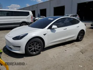 2021 Tesla Model 3 Standard Range Plus z VIN 5YJ3E1EA3MF085641, wystawiony jako Copart lot #56849295 z przebiegiem 123 350 mil mil oraz Tytuł czysty. Historia ofert i sprzedaży dostępna na DreamBid. Obrazek 1.