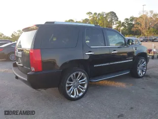 2009 Cadillac Escalade with VIN 1GYFK13259R152009, listed as a IAAI auction lot 41510032 with 161,401 mi miles. Bid and sale history available at carsss.com. Image 4.