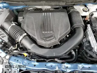 2024 Chevrolet Traverse AWD Z71 z VIN 1GNEVJKS7RJ197307, wystawiony jako Copart lot #51762245 z przebiegiem Nie podano mil oraz Szkoda całkowita • Salvage title. Historia ofert i sprzedaży dostępna na DreamBid. Obrazek 14.