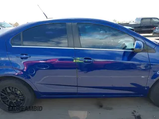2013 Chevrolet Sonic LT with VIN 1G1JC5SG0D4168831, listed as a IAAI auction lot 42124531 with 149,096 mi miles and . Bid and sale history available at DreamBid. Image 13.