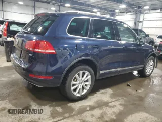 2014 Volkswagen Touareg Lux z VIN WVGEF9BP4ED006236, wystawiony jako Copart lot #47394505 z przebiegiem 85 179 mil mil oraz Szkoda całkowita • Salvage title. Historia ofert i sprzedaży dostępna na DreamBid. Obrazek 3.