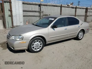 2000 Nissan Maxima GXE z VIN JN1CA31D0YT712485, wystawiony jako Copart lot #54956875 z przebiegiem 187 942 mil mil oraz Czysty tytuł • Clean title. Historia ofert i sprzedaży dostępna na DreamBid. Obrazek 1.