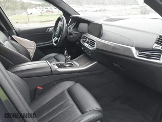 2021 BMW X5 xDrive40i with VIN 5UXCR6C01M9H56800, listed as a IAAI auction lot 41860035 with 51,779 mi miles. Bid and sale history available at carsss.com. Image 5.
