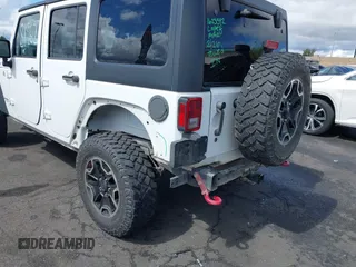 2016 Jeep Wrangler Unlimited Rubicon with VIN 1C4HJWFG7GL254143, listed as a IAAI auction lot 41781962 with 114,435 mi miles and . Bid and sale history available at DreamBid. Image 6.