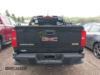 2017 GMC Canyon 4WD SLE z VIN 1GTG6CEN9H1140962, wystawiony jako IAAI lot #42251320 z przebiegiem 142 099 mil mil oraz . Historia ofert i sprzedaży dostępna na DreamBid. Obrazek 16.