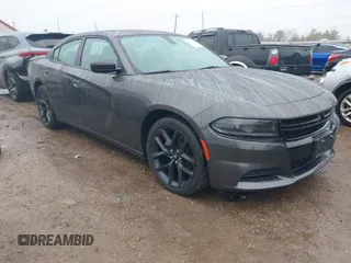 2023 Dodge Charger SXT with VIN 2C3CDXBG8PH566020, listed as a IAAI auction lot 41433879 with 22,187 mi miles and . Bid and sale history available at DreamBid. Image 1.