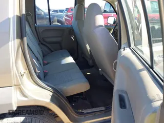 2007 Jeep Liberty Sport with VIN 1J4GK48K77W502284, listed as a IAAI auction lot 41323341 with 223,050 mi miles. Bid and sale history available at carsss.com. Image 8.