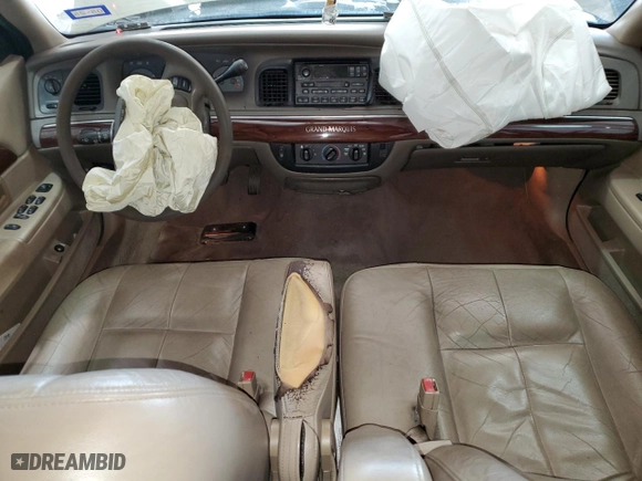 2003 Mercury Grand Marquis GS Convenience with VIN 2MEFM74W43X706057, listed as a Copart auction lot 65842884 with 215,829 mi miles and Salvage Title. Bid and sale history available at carsss.com. Image 8.