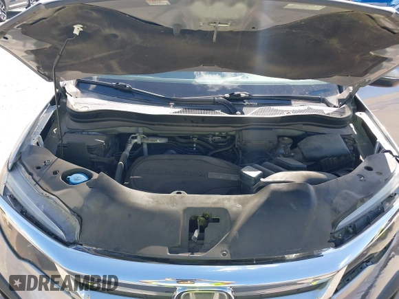 2020 Honda Pilot EX-L with VIN 5FNYF5H46LB004744, listed as a IAAI auction lot 42095298 with 76,159 mi miles and . Bid and sale history available at DreamBid. Image 10.