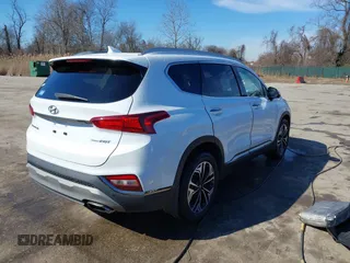 2020 Hyundai Santa Fe Limited with VIN 5NMS5CAA0LH150391, listed as a IAAI auction lot 41651076 with 66,713 mi miles. Bid and sale history available at carsss.com. Image 4.