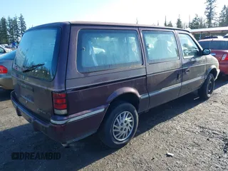 1993 Dodge Grand Caravan with VIN 1B4GK44R4PX675504, listed as a IAAI auction lot 42010737 with 219,886 mi miles and . Bid and sale history available at DreamBid. Image 4.