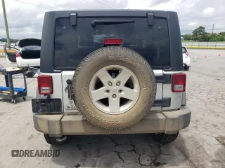 2012 Jeep Wrangler Sport z VIN 1C4AJWAG4CL185009, wystawiony jako Copart lot #61203395 z przebiegiem 93 534 mil mil oraz Szkoda całkowita • Salvage title. Historia ofert i sprzedaży dostępna na DreamBid. Obrazek 6.