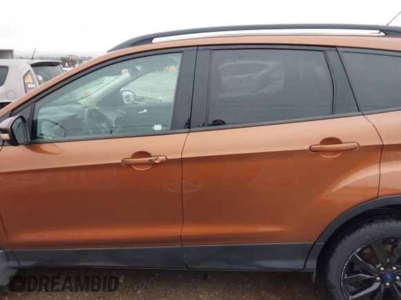 2017 Ford Escape Titanium with VIN 1FMCU9J99HUB75687, listed as a IAAI auction lot 41180789 with 108,967 mi miles. Bid and sale history available at carsss.com. Image 15.