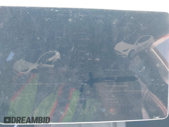 2022 Tesla Model Y Long Range z VIN 7SAYGDEE9NF509655, wystawiony jako IAAI lot #42433796 z przebiegiem 46 936 mil mil oraz . Historia ofert i sprzedaży dostępna na DreamBid. Obrazek 7.