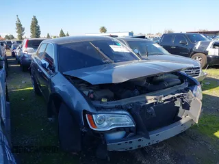 2012 Chrysler 300 Limited with VIN 2C3CCACG9CH249856, listed as a IAAI auction lot 38629940 with Not Provided miles and . Bid and sale history available at DreamBid. Image 1.