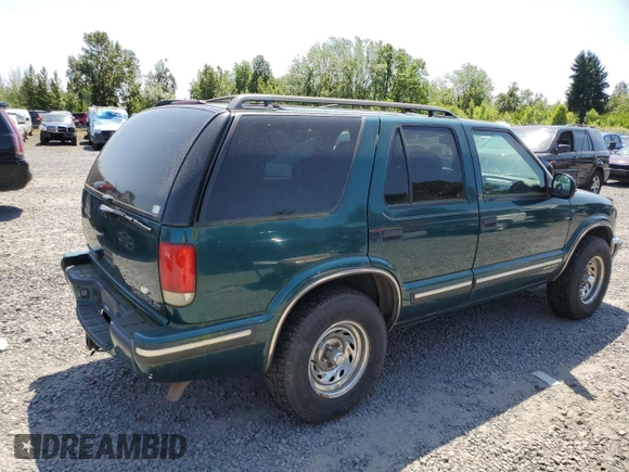 1998 Chevrolet Blazer LS with VIN 1GNDT13W5W2184533, listed as a Copart auction lot 59441555 with 124,339 mi miles and Clean title. Bid and sale history available at DreamBid. Image 3.