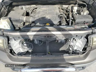 2012 Toyota Tundra z VIN 5TFDW5F14CX216264, wystawiony jako Copart lot #60983285 z przebiegiem 186 869 mil mil oraz Szkoda całkowita • Salvage title. Historia ofert i sprzedaży dostępna na DreamBid. Obrazek 11.