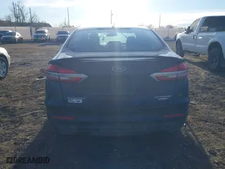2020 Ford Fusion Hybrid Titanium with VIN 3FA6P0RU9LR141476, listed as a IAAI auction lot 41472921 with 84,433 mi miles. Bid and sale history available at carsss.com. Image 17.