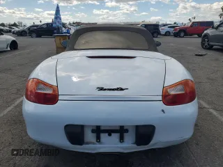 1999 Porsche Boxster z VIN WP0CA2984XU629987, wystawiony jako Copart lot #51366845 z przebiegiem Nie podano mil oraz Czysty tytuł • Clean title. Historia ofert i sprzedaży dostępna na DreamBid. Obrazek 6.