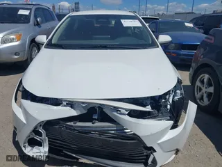 2024 Toyota Corolla Hybrid LE with VIN JTDBCMFE5R3049992, listed as a IAAI auction lot 41770707 with 47,180 mi miles. Bid and sale history available at carsss.com. Image 6.